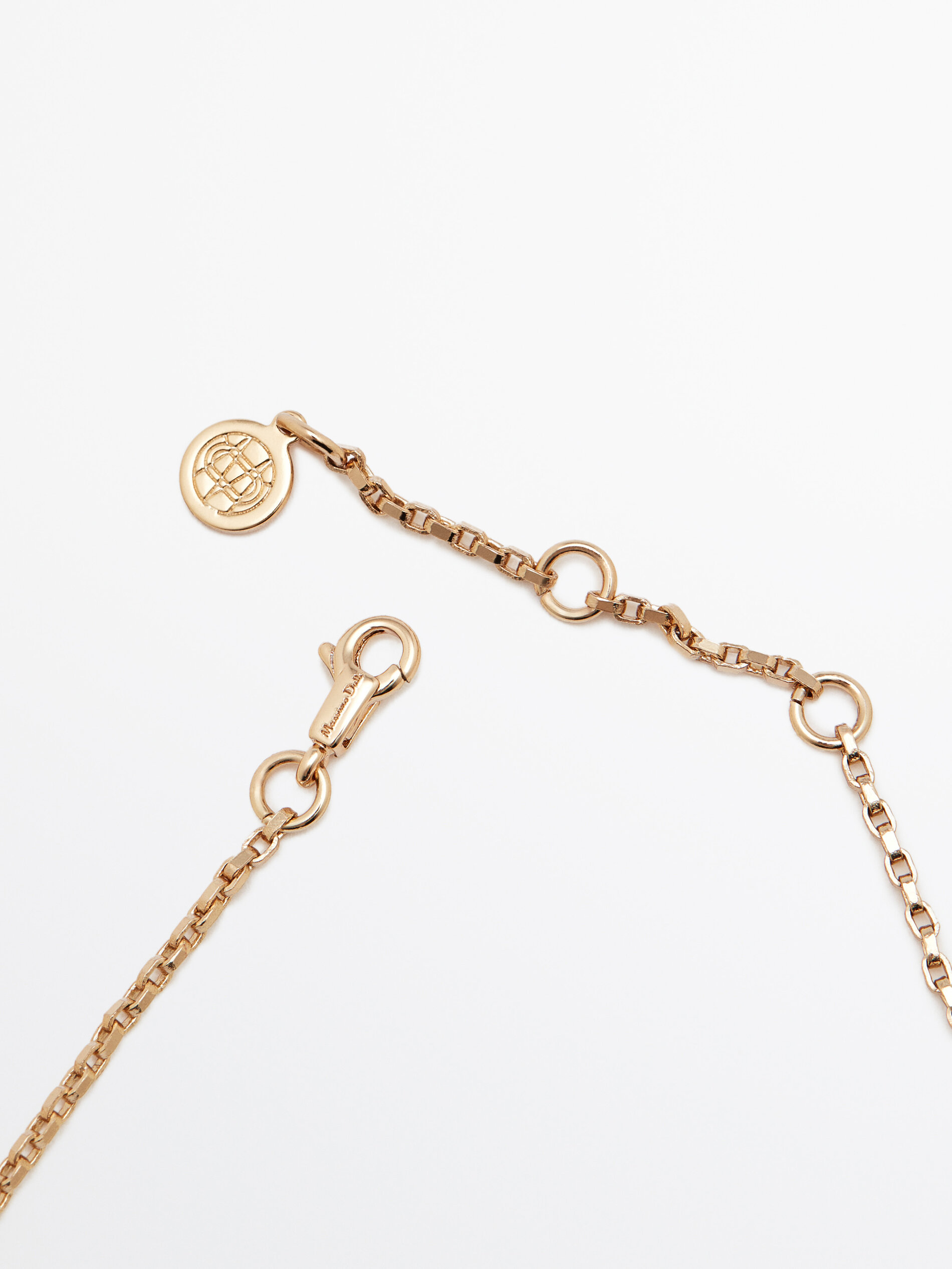 Colar comprido com textura de moeda dourada - DOURADO