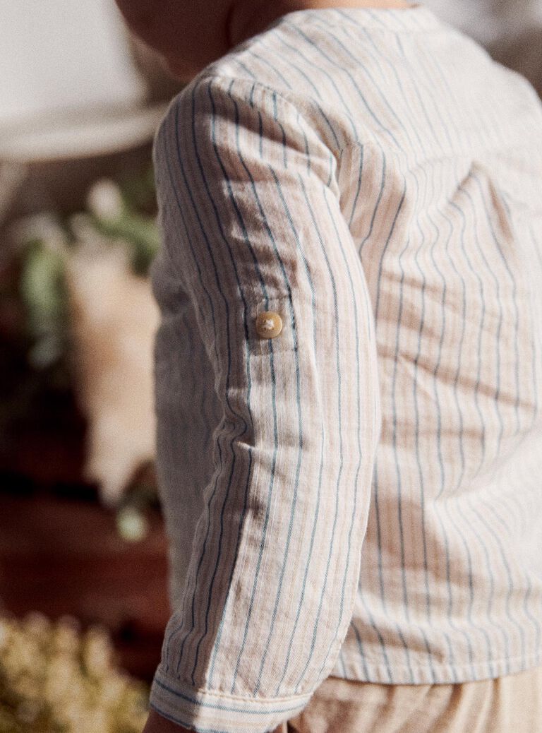 Chemise à rayures beige et bleu