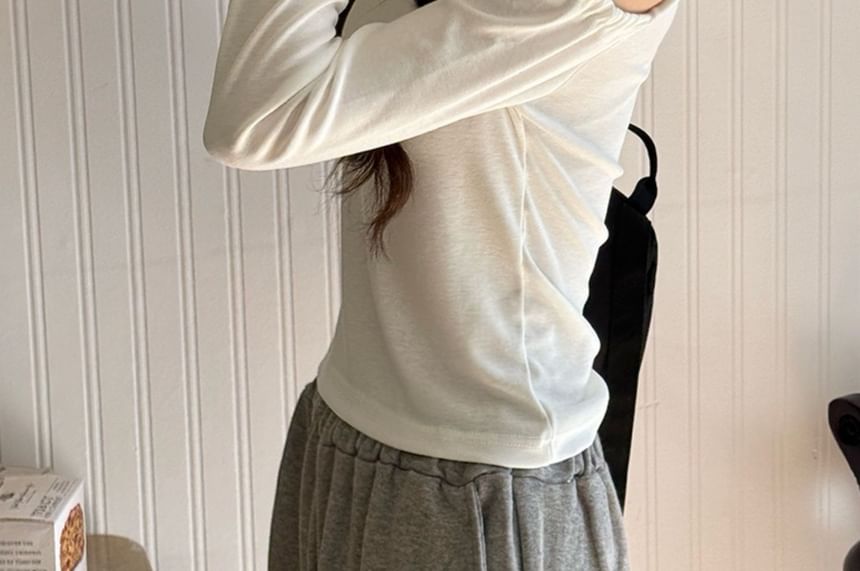 SeoulPop - Slim-fit top met lange mouwen en blote schouders en strik