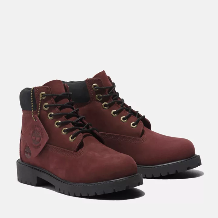 Bota Timberland Premium de 6 polegadas para jovens na cor bordô.