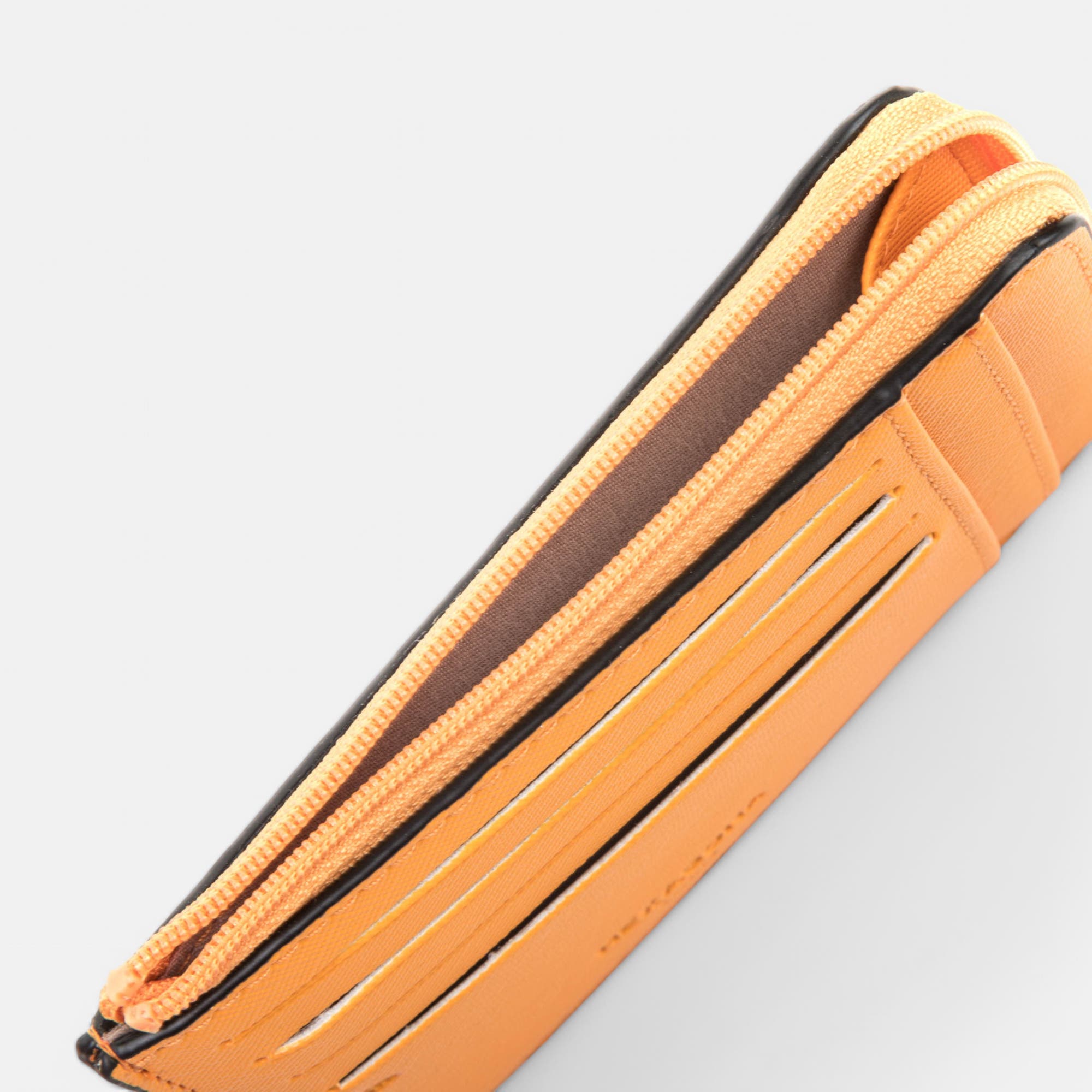 Petite maroquinerie orange