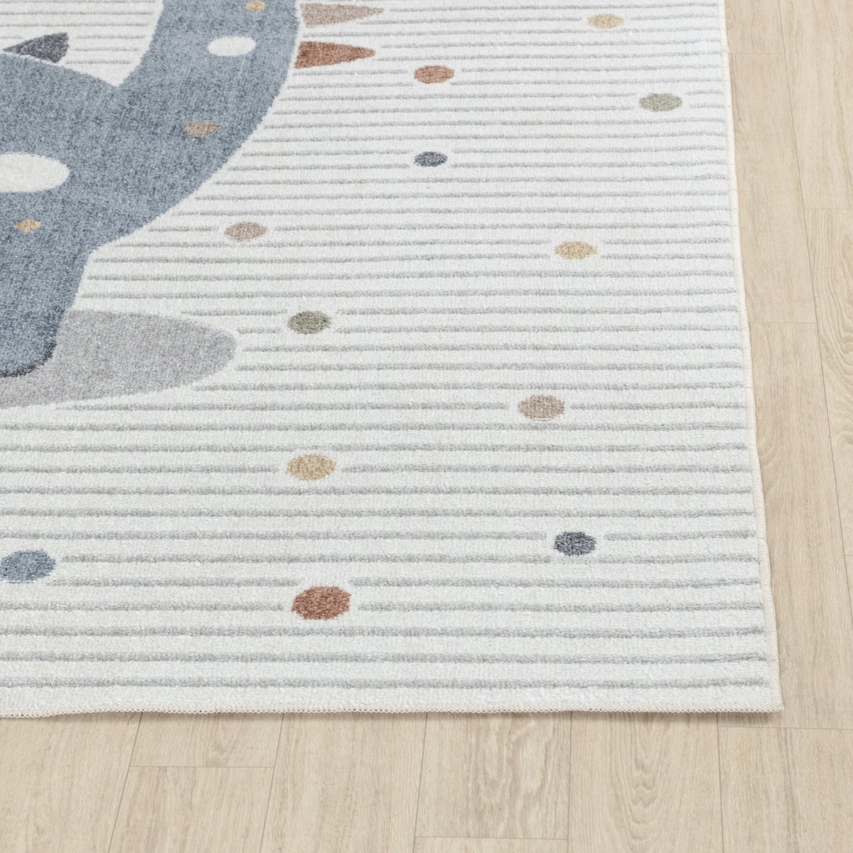 Machinewasbaar kinderkleed met dinosaurusmotief, beige/grijs, 80x150 cm.