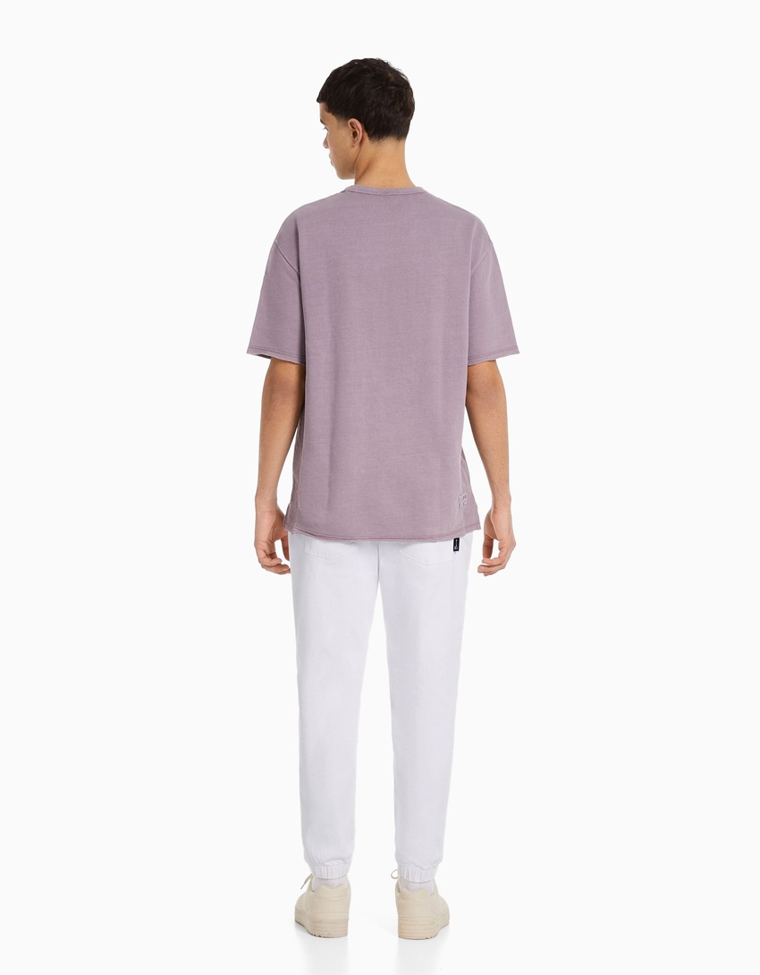 calça jogger rasgada