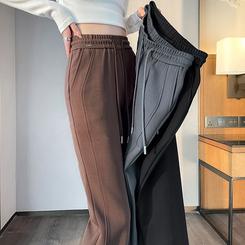 Lexama - Effen wijd uitlopende joggingbroek met trekkoord in de taille