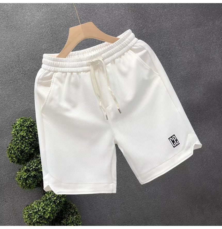 Mokoloko - Sweatshorts met trekkoord en letterprint