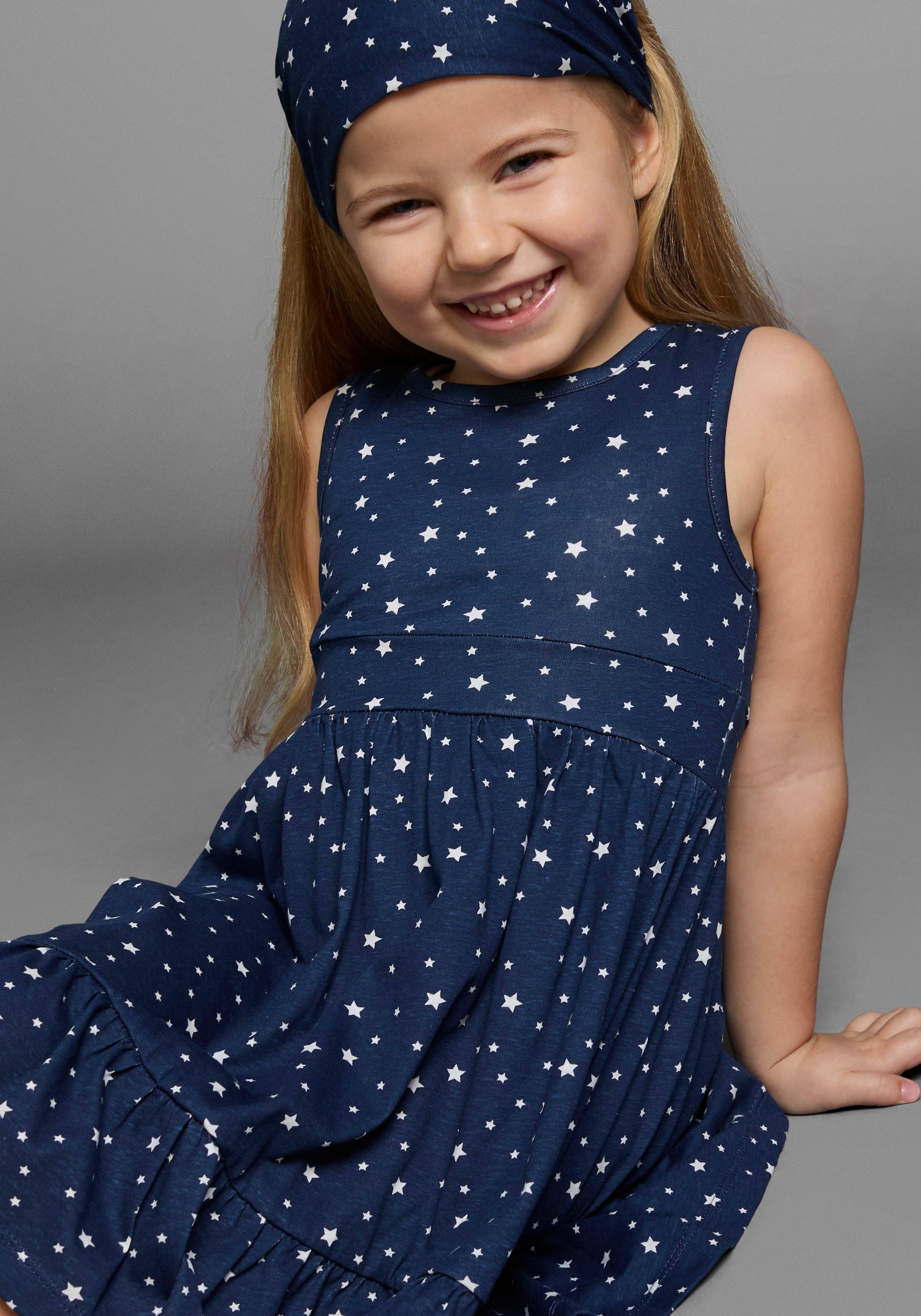 KIDSWORLD Jerseykleid »2tlg. Shirtkleid + Haarband im niedlichen Sternen-Allover« Set, 2 Stk. tlg. festliche Anlässe,  knielang,  verspielter Stil,  aus Baumwolle
