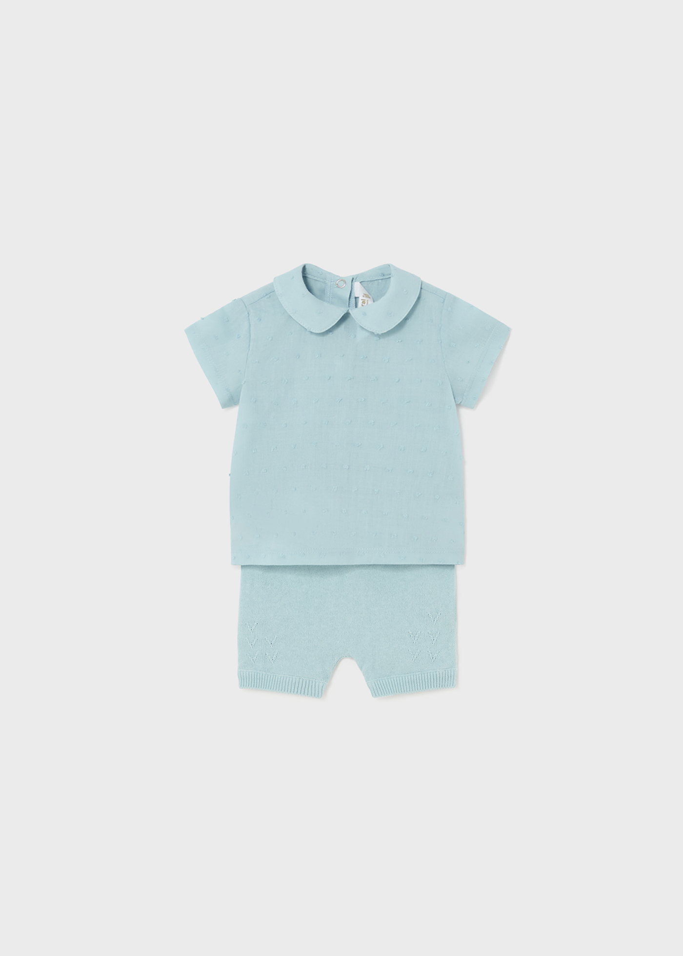 Conjunto de calça e blusa de malha Niagara de duas peças para recém-nascidos.