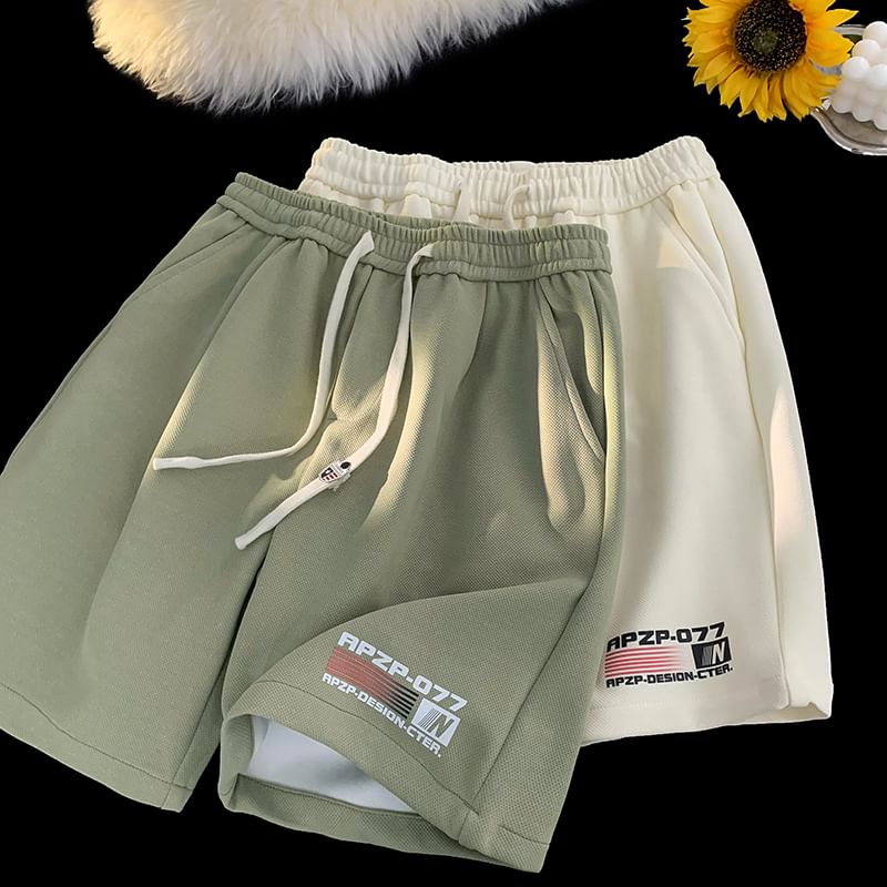 Kimeya - Zweetshorts met trekkoord in de taille, letters en nummers