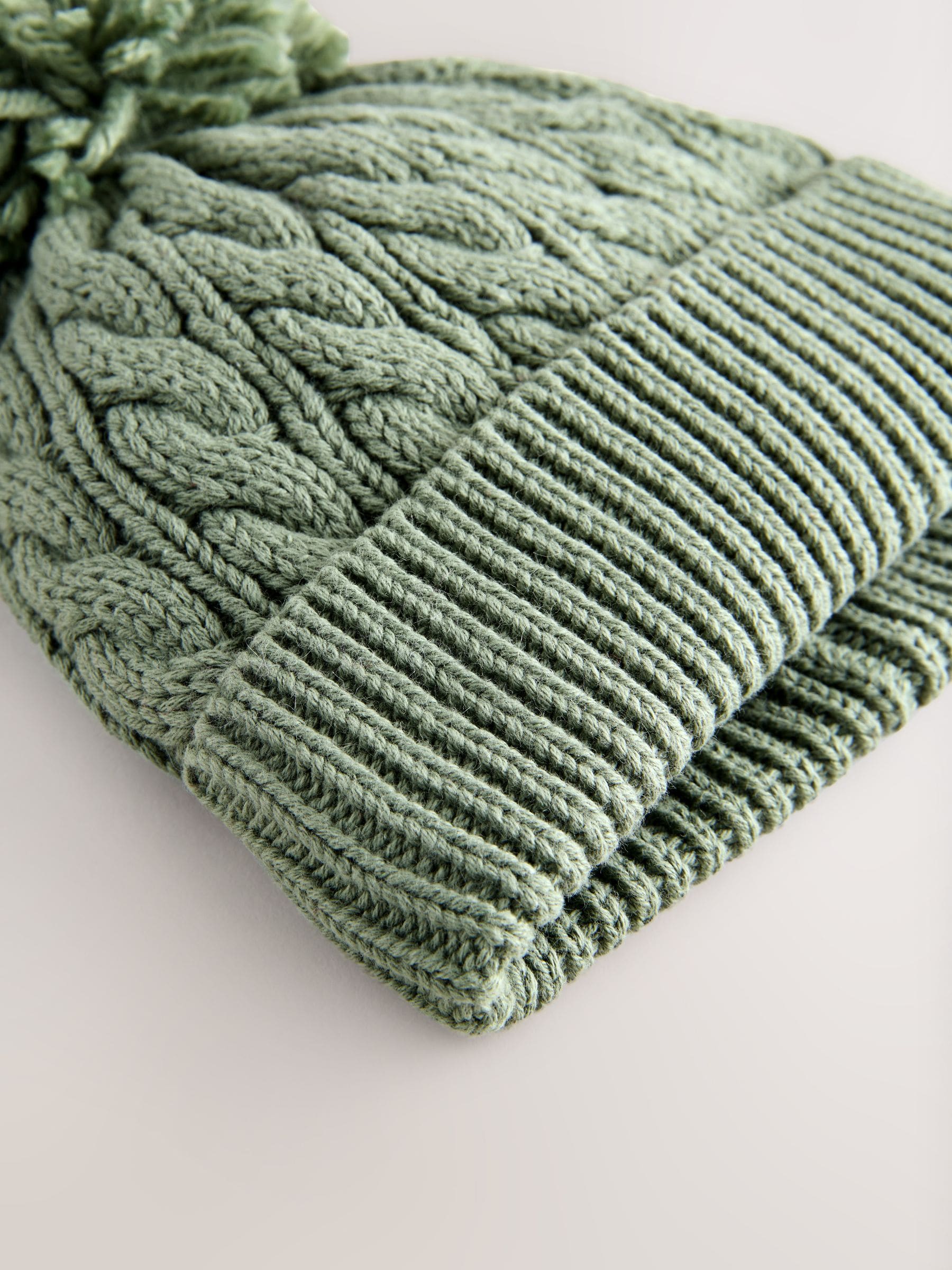 Groen - Gebreide Baby muts met pompon (0mnd -2jr)