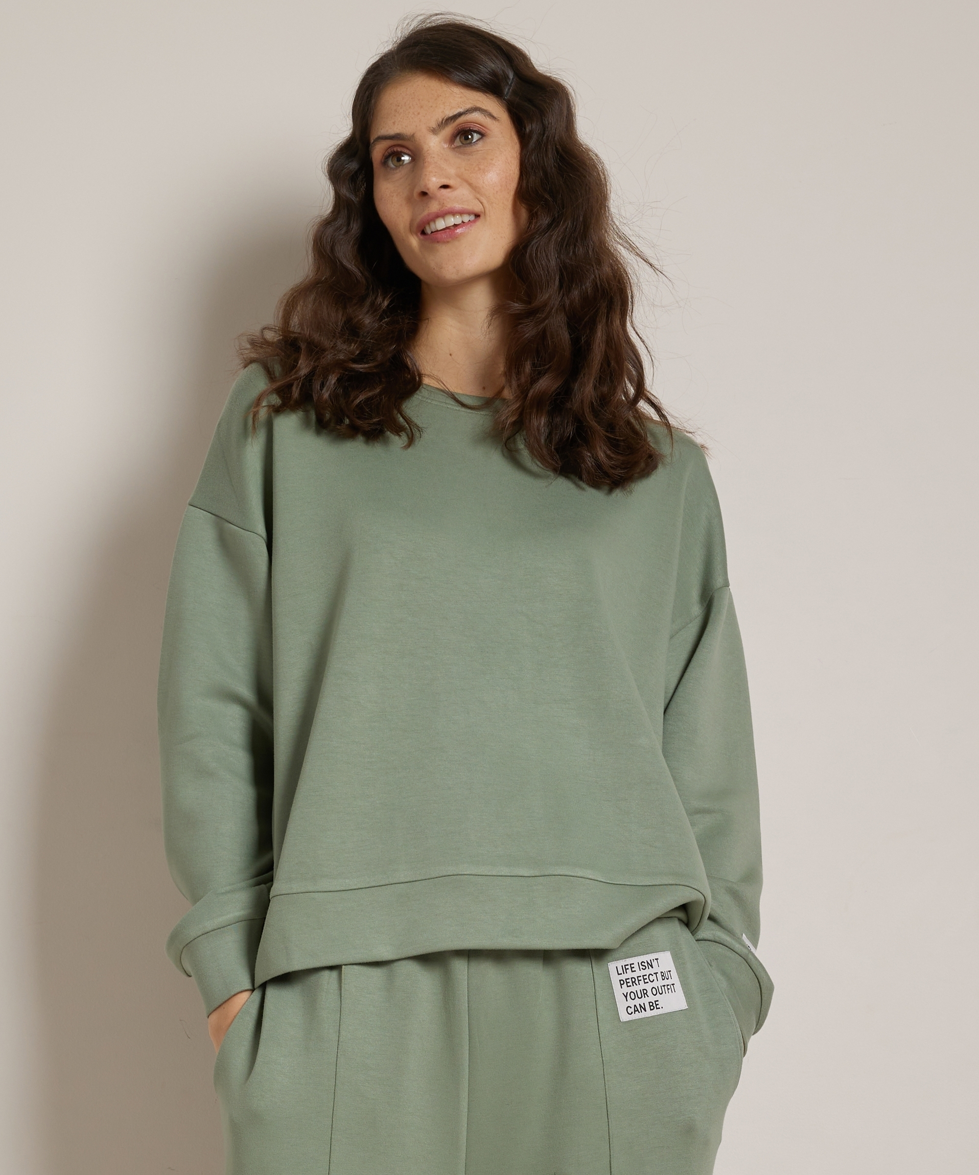 trui met mouwlabel