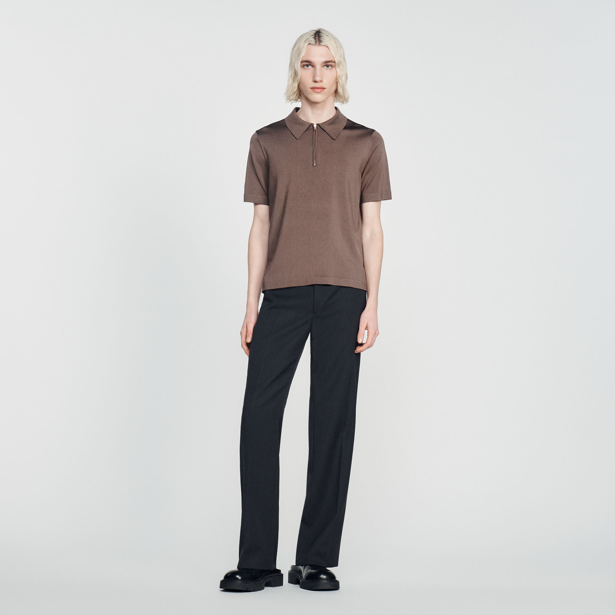 Polo en maille á col zippe