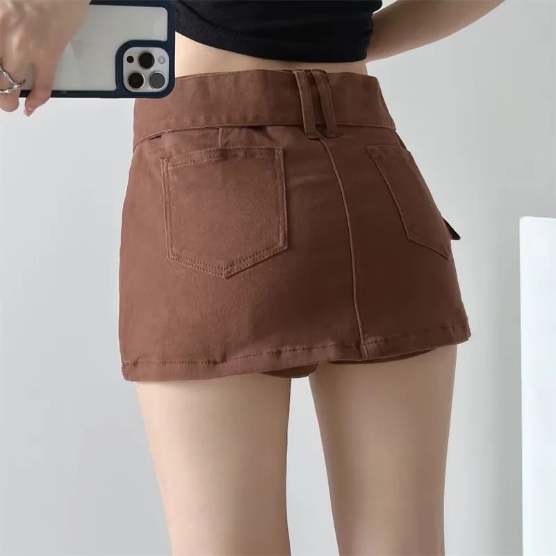 Reknovine - Mini denim rok met lage taille en riemaccent