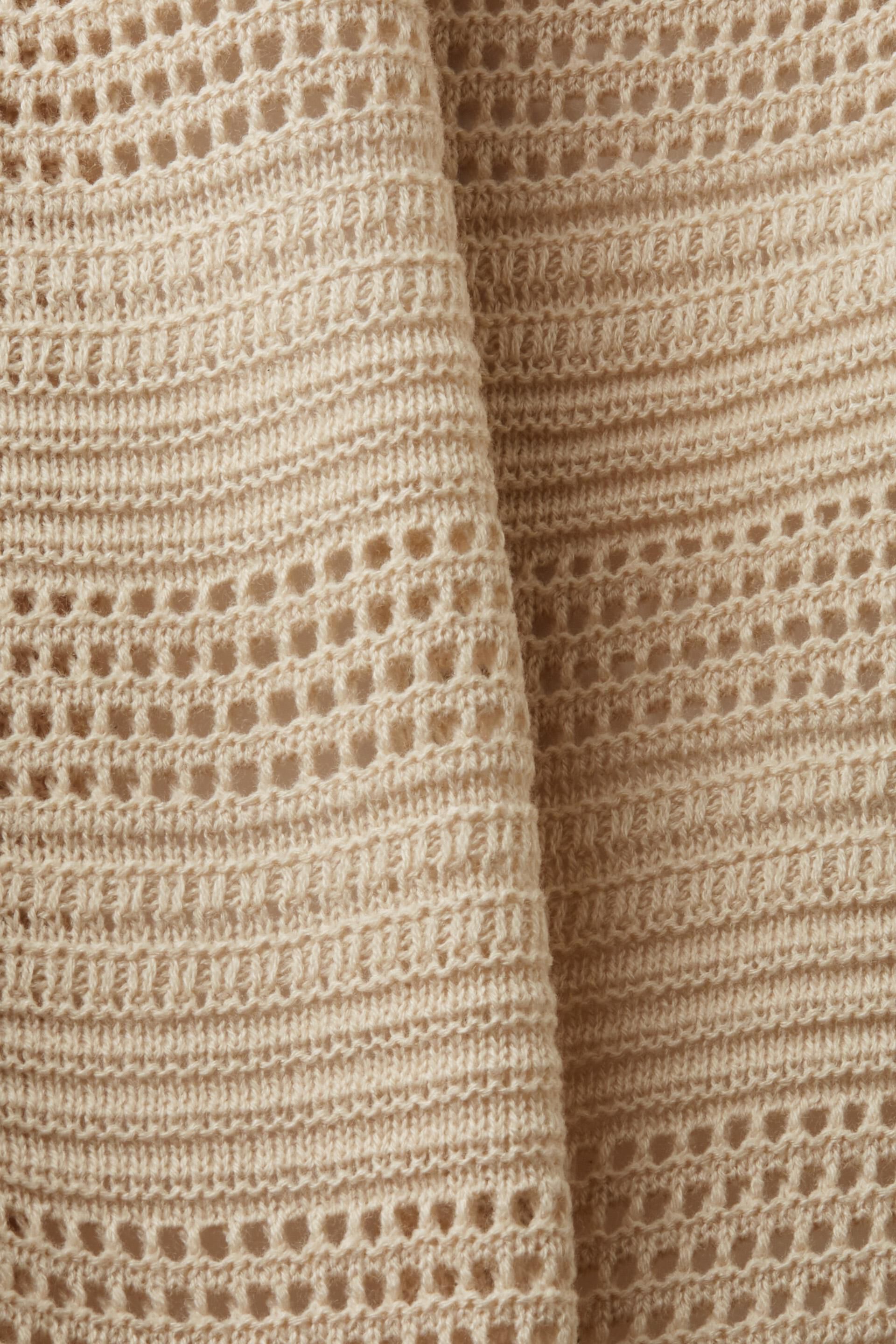Cardigan sans manches à motif au crochet
