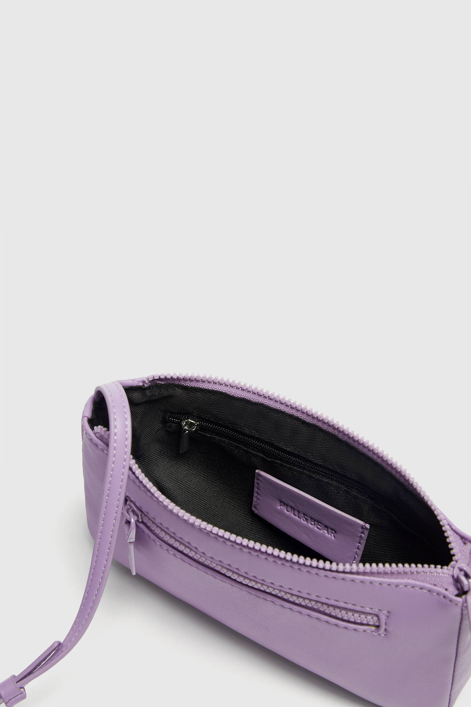 Bolsa transversal com detalhe de zíper - Malva