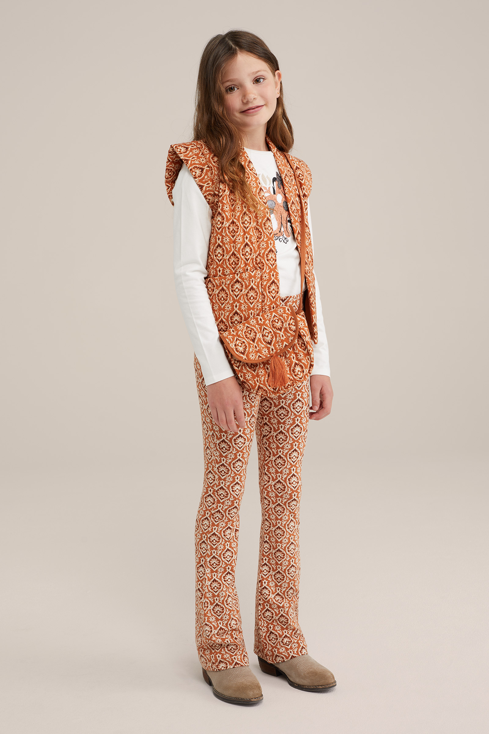 Meisjes flared legging met dessin WE Fashion Oranje