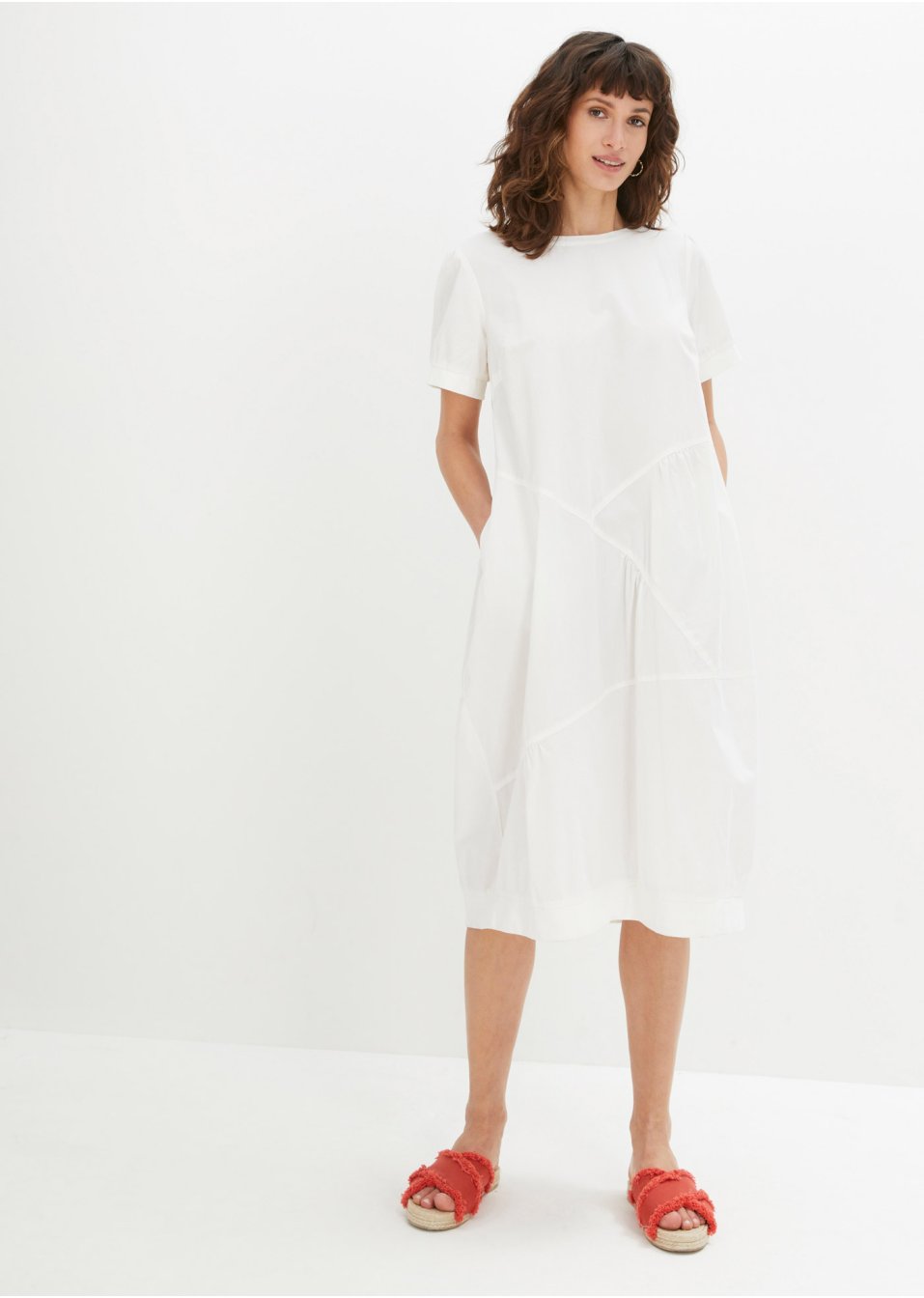 Robe avec poches latérales, forme en O