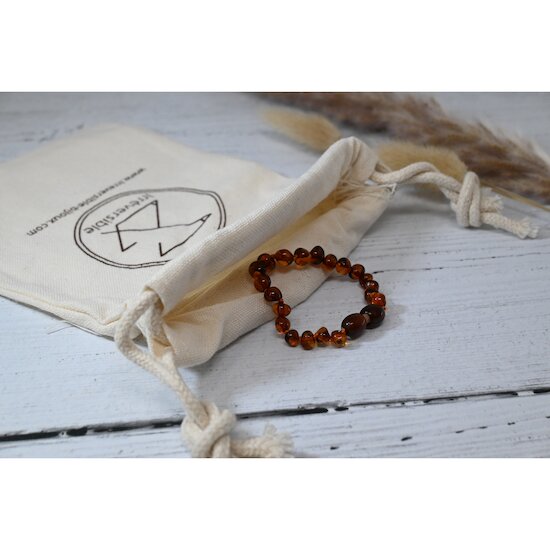 Bracelet Ambre bébé   Cognac        de               Irréversible