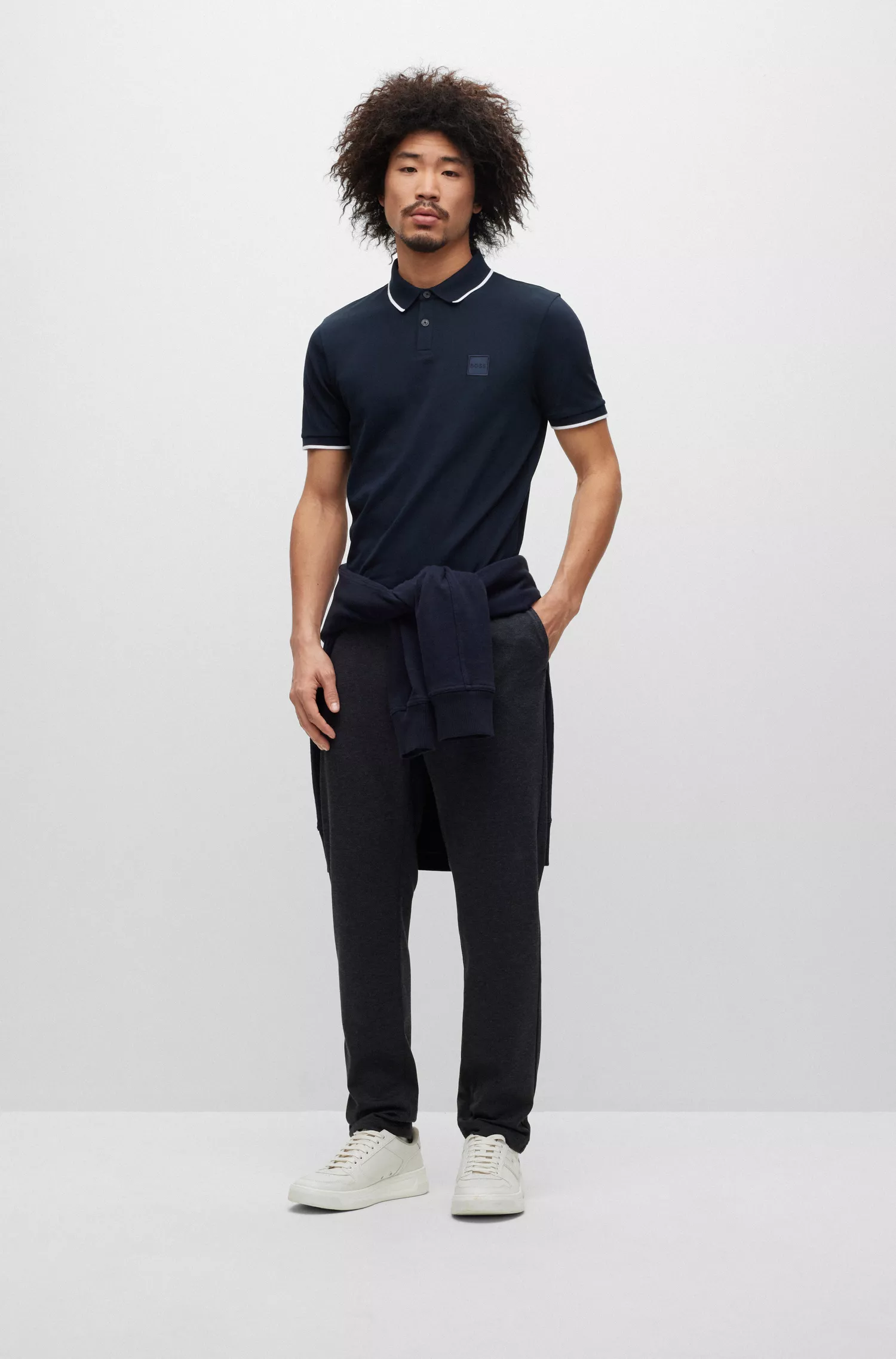 Camisa polo BOSS laranja, de algodão stretch, corte slim, com etiqueta de logotipo.