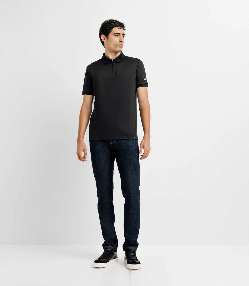 Polo col zippé avec patch noir