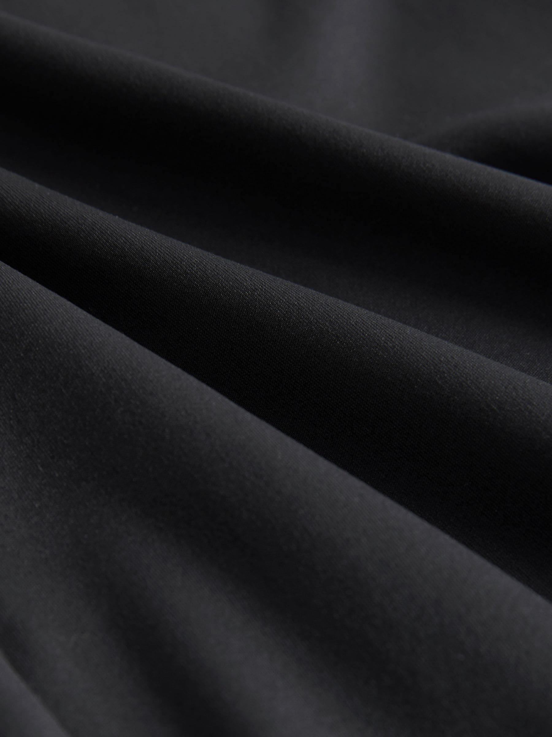 Zwart - Superzachte Dry Tech yogasportleggings met uitlopende pijpen