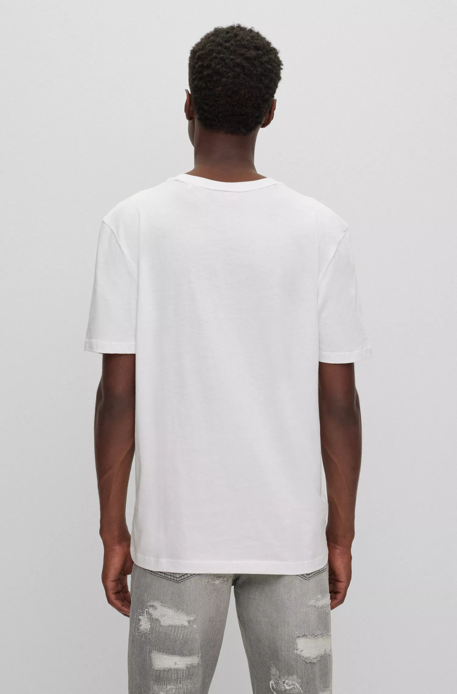 Camiseta HUGO vermelha em malha de algodão com estampa de logos sobrepostos