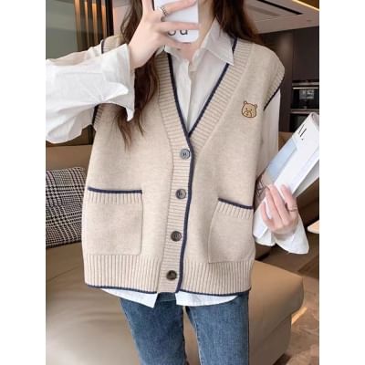Surbane - V-hals vest met contrasterende rand en geborduurde beer
