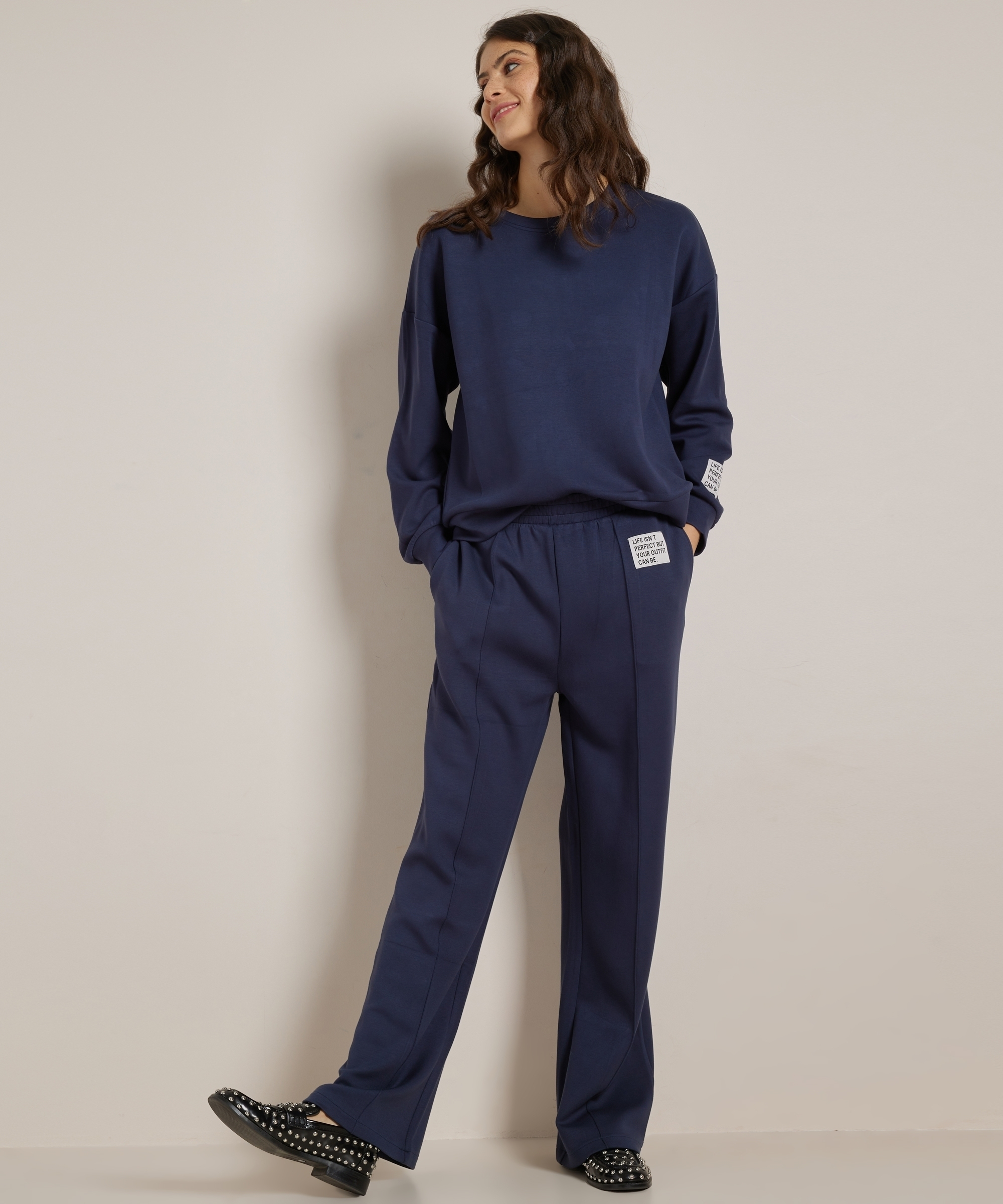 trui met mouwlabel
