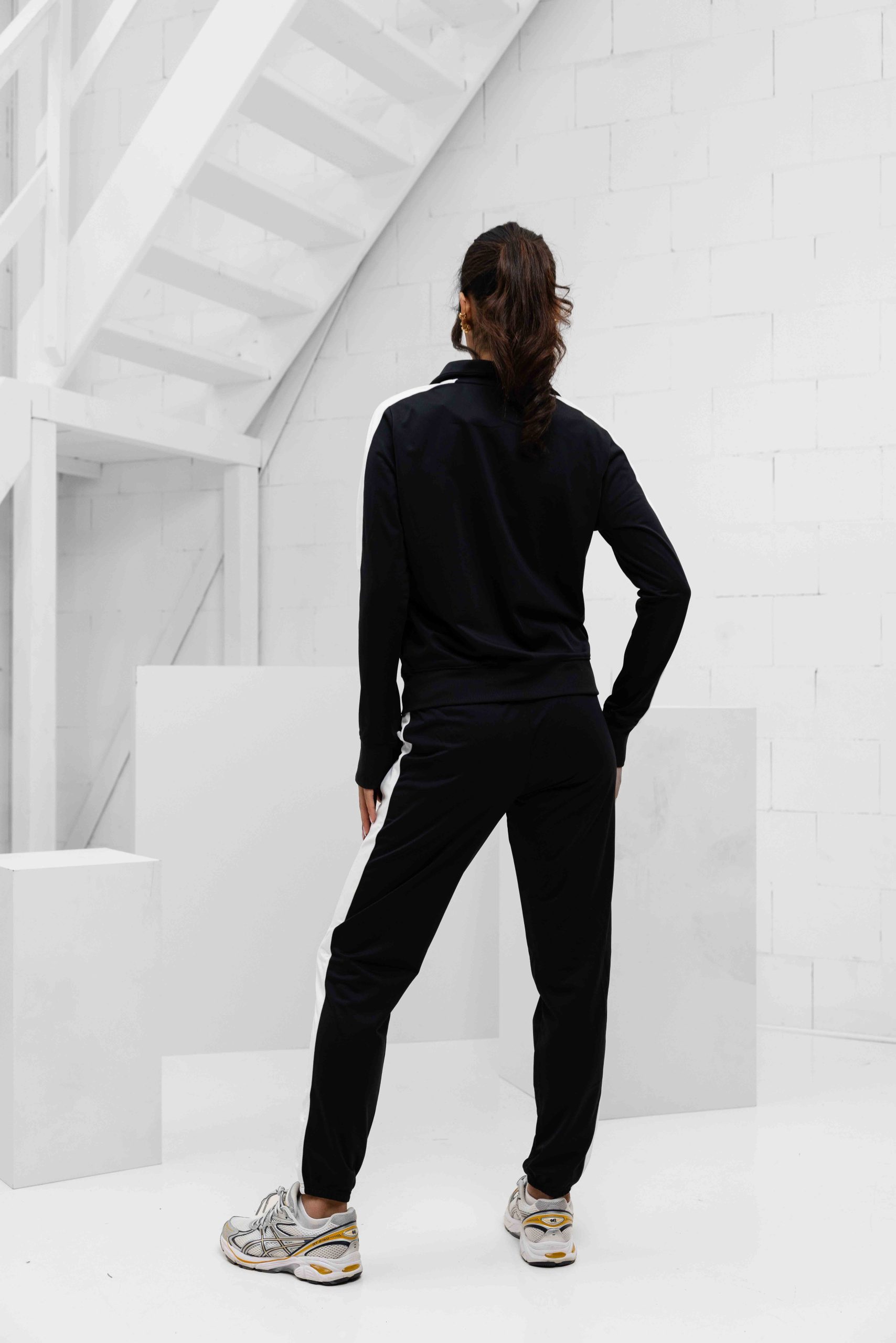 Under Armour Tricot Trainingspak Dames Zwart