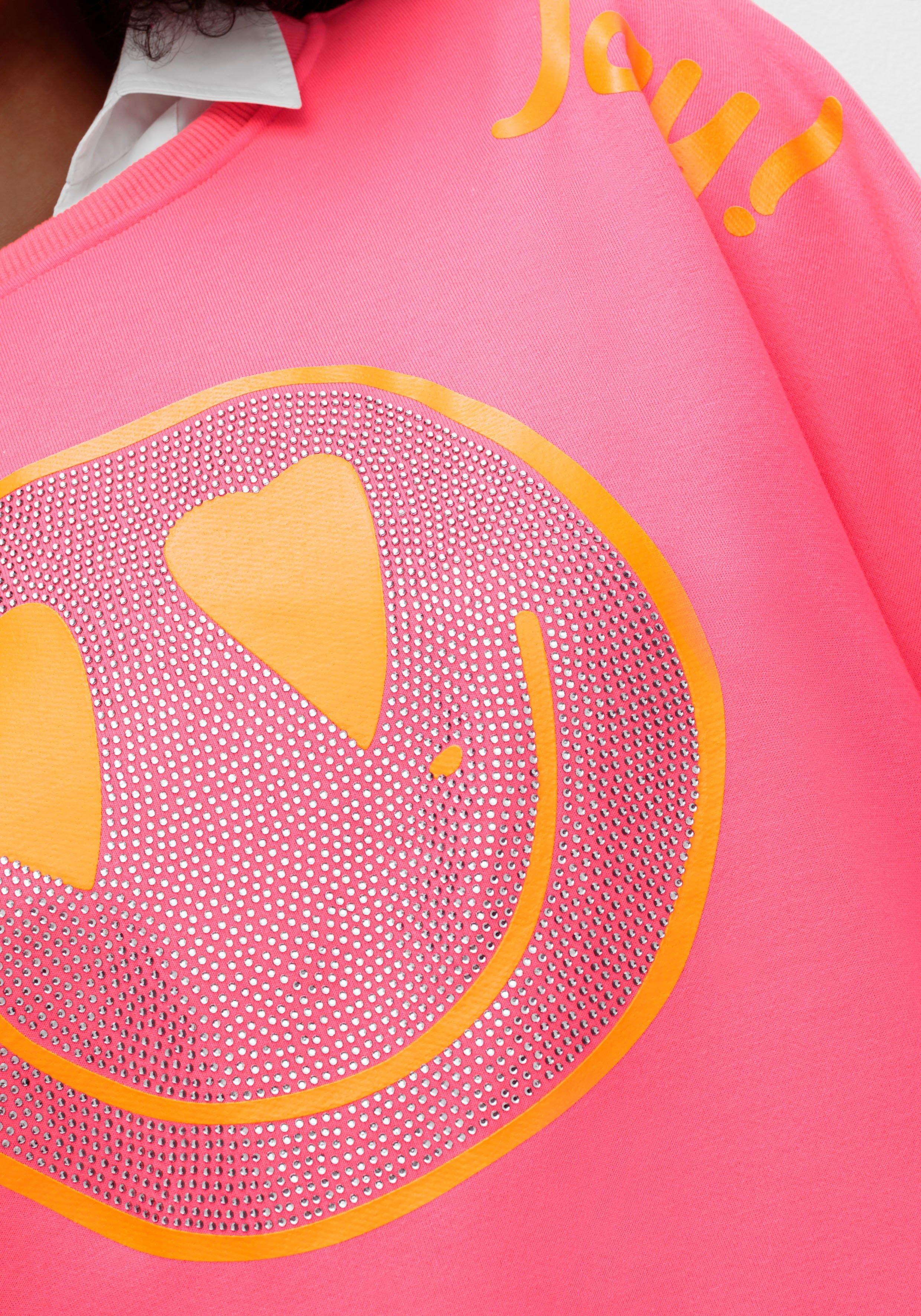 Sweatshirt mit Smiley-Frontdruck und Glitzersteinen