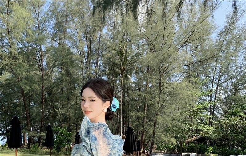 Moanum - Maxi A-lijn jurk met pofmouwen en off-shoulder bloemenprint