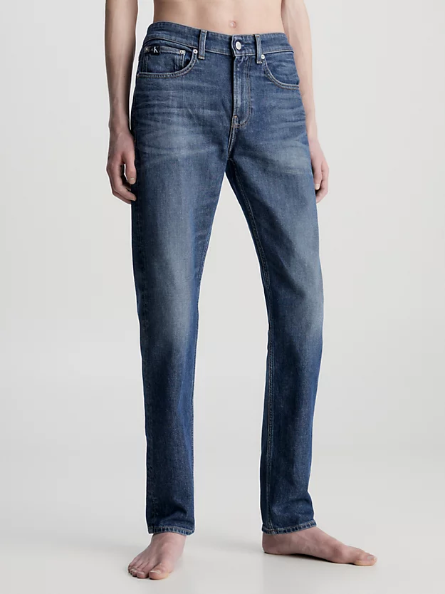 Calça jeans slim fit afunilada