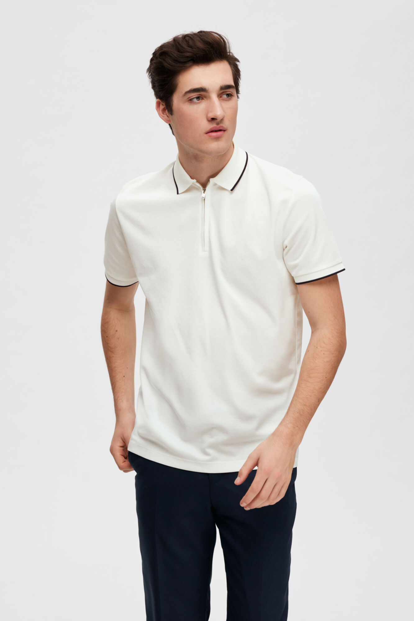 Camisa polo de manga curta com zíper em algodão orgânico. - Branca