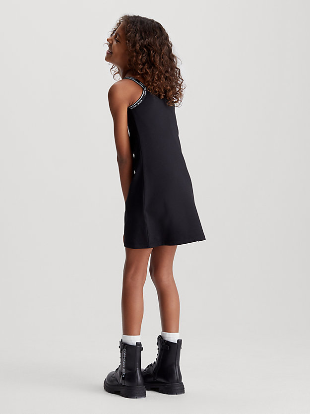Vestido Milano em malha com fita com o logotipo.