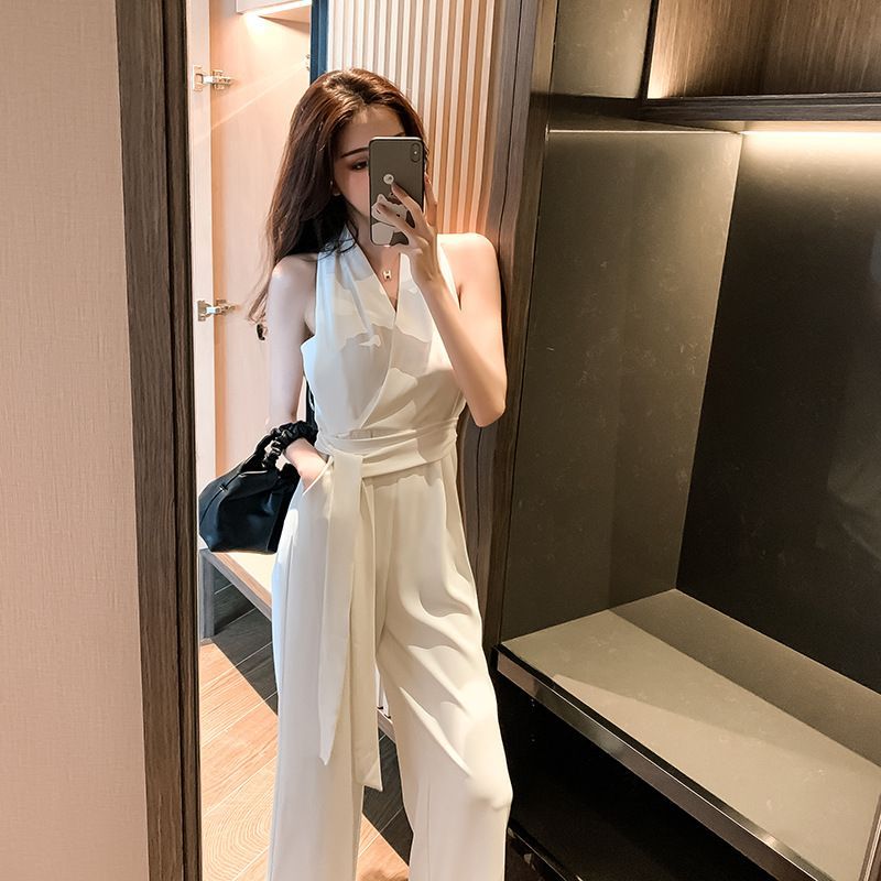 Morning Glory - Mouwloze jumpsuit met wijde pijpen