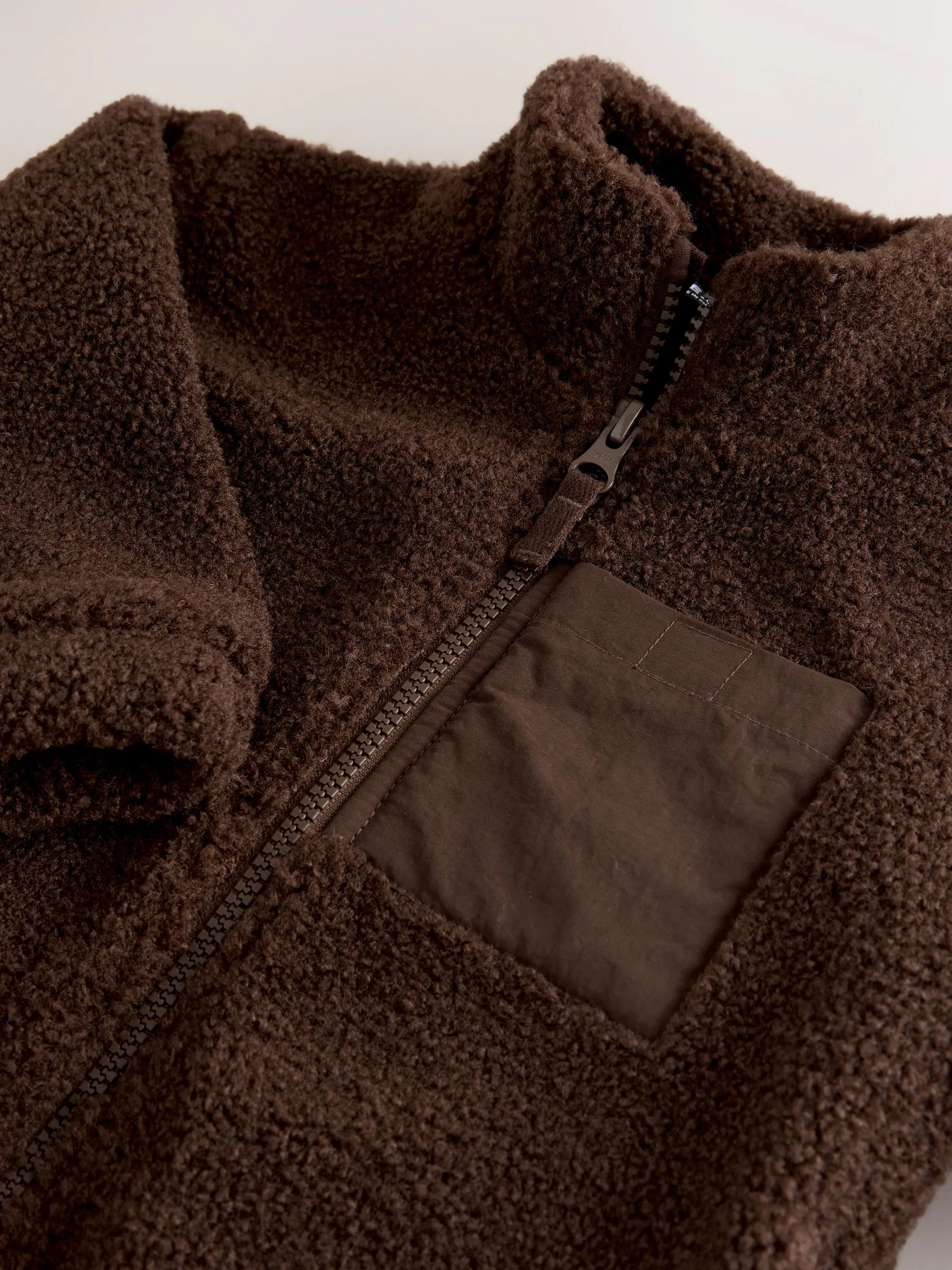 Chocoladebruin - Effen fleece met rits en trechterhals (3mnd-7jr)