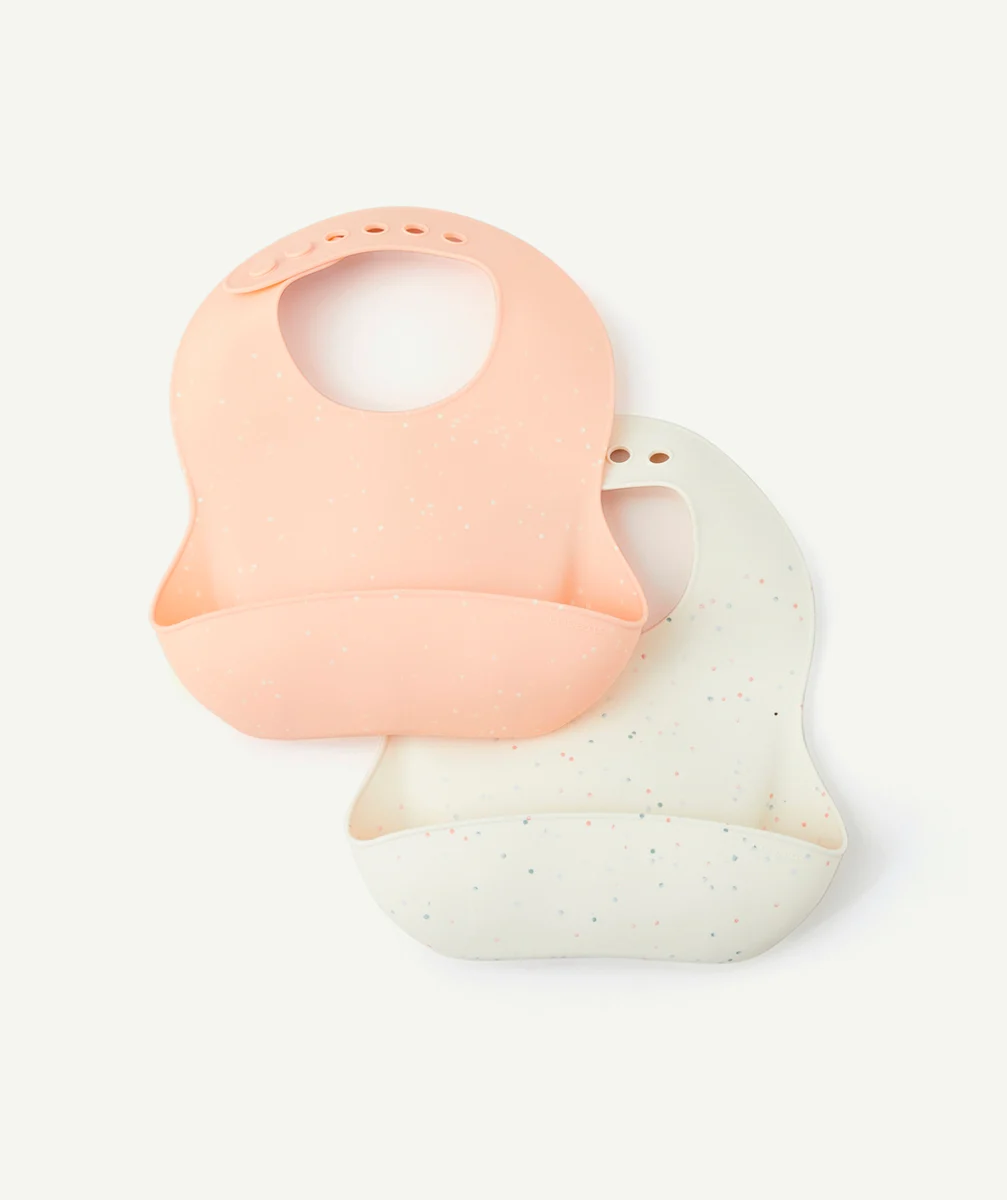 LASSIGLOT 2 BAVOIRS EN SILICONE COULEUR ABRICOT ET BLANC