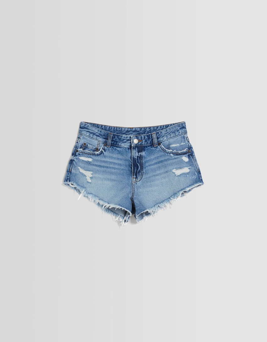 Shorts jeans vintage com rasgos