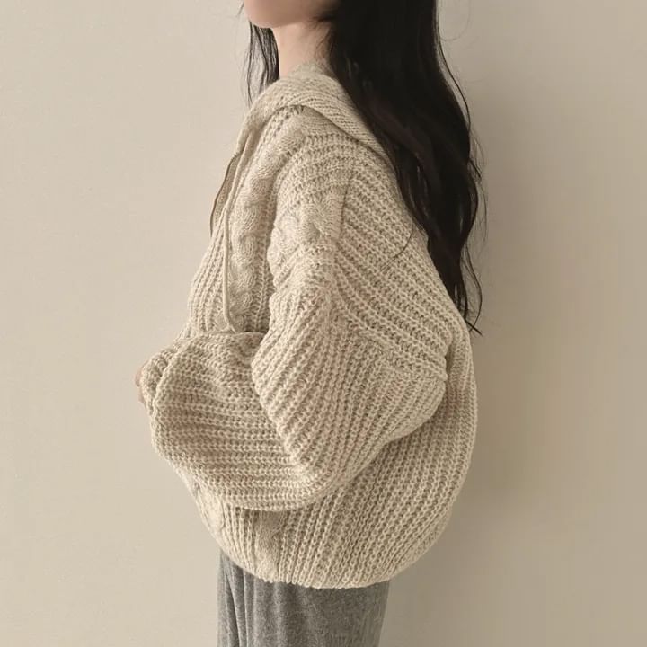 MIKIGA - Oversized kabelgebreide hoodie met rits