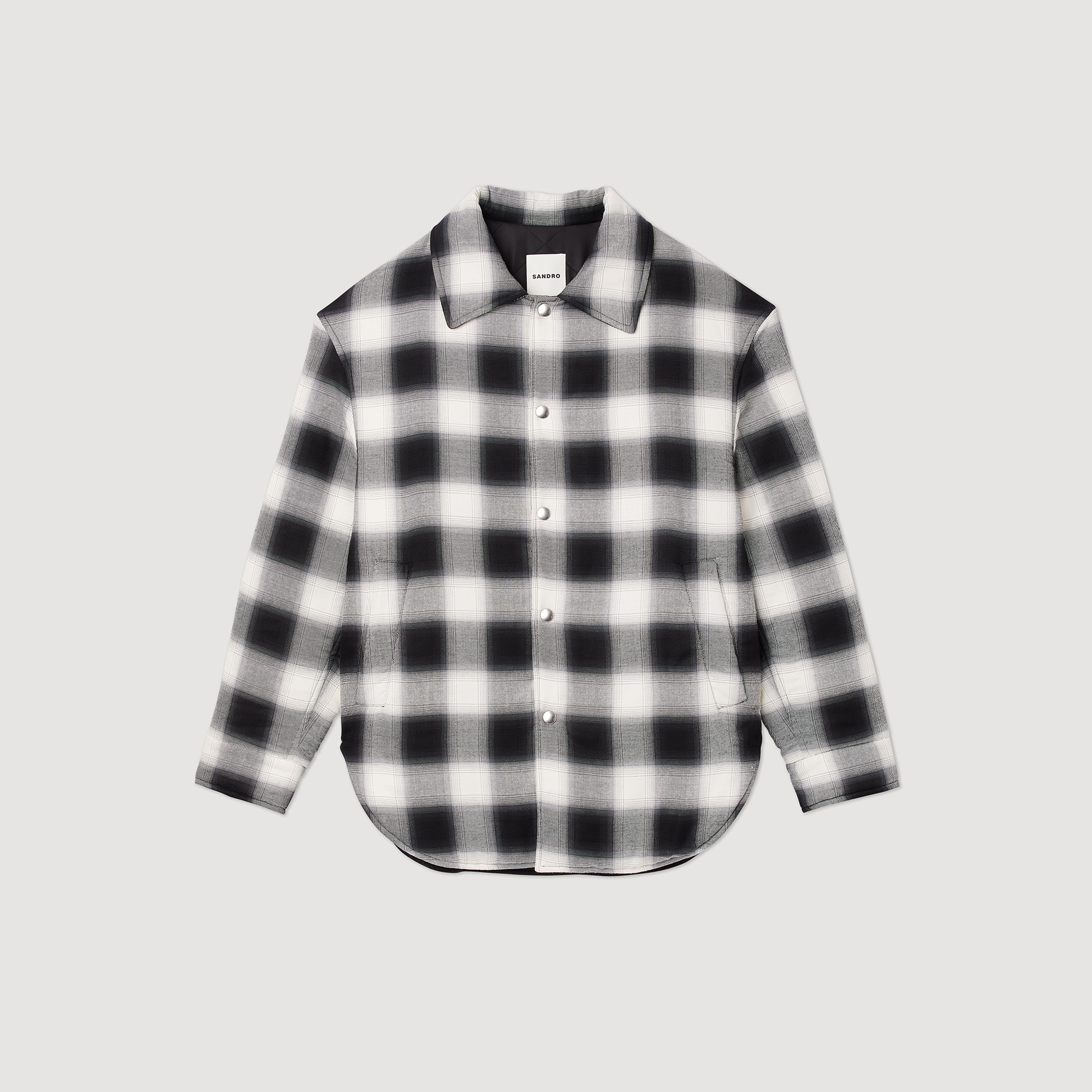 Blouson matelasse á carreaux
