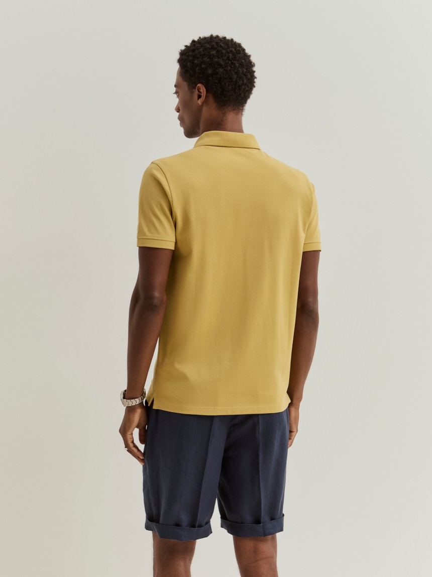 Polo piqué slim fit garment dye