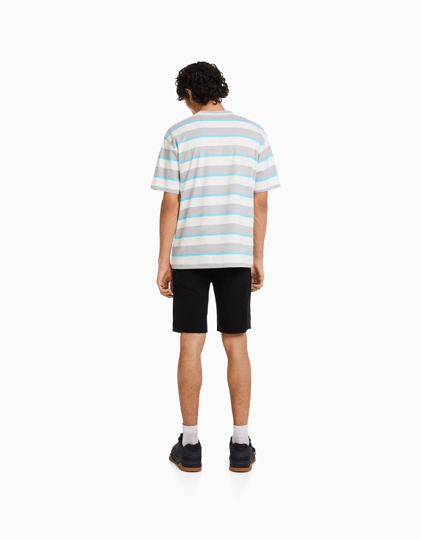 Bermuda jeans rasgada de corte justo