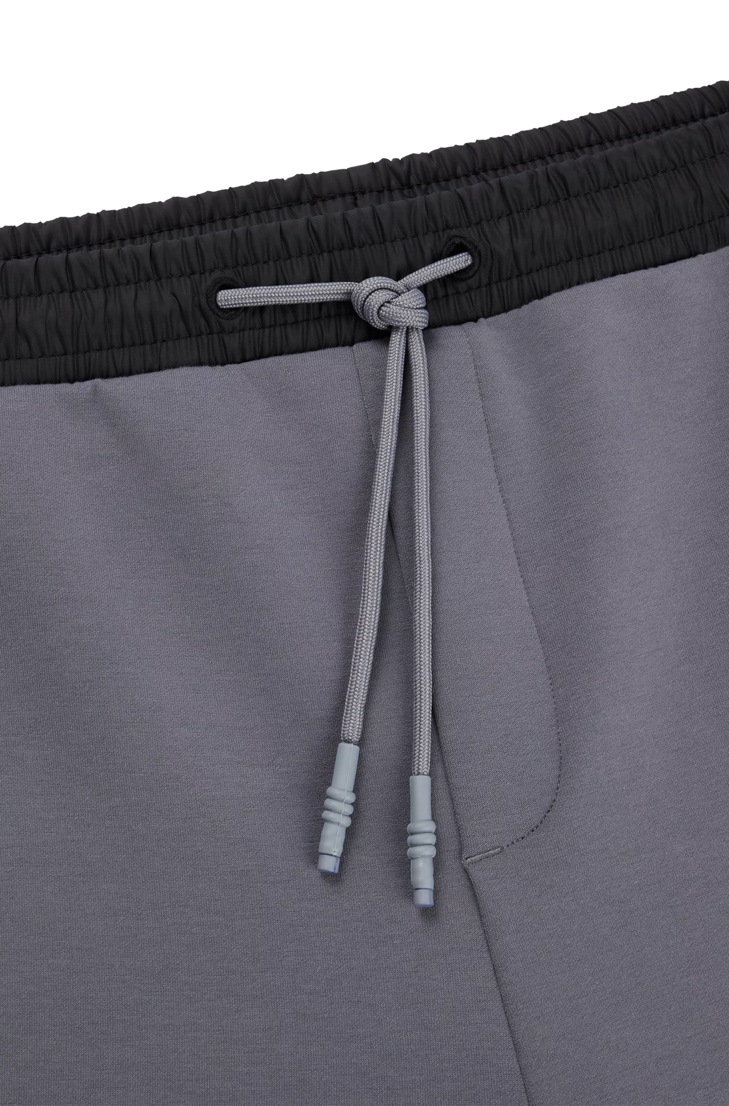 Calça de fato de treino BOSS verde, em tecido misto, com logótipo estampado.