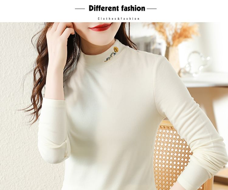 Jeonseon - T-shirt met lange mouwen en hoge hals en bloemenborduursel