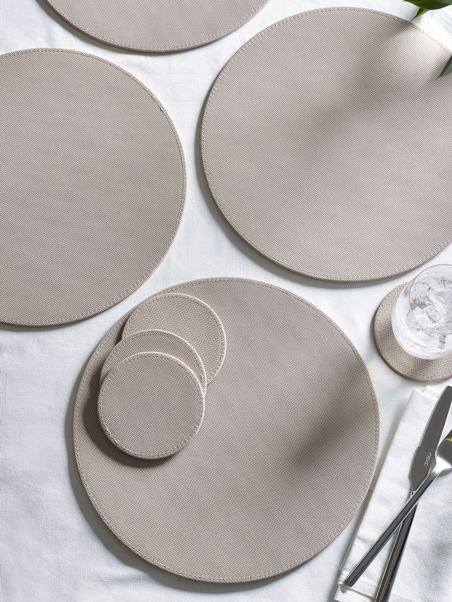 Set van 4 omkeerbare placemats en onderzetters van imitatieleer