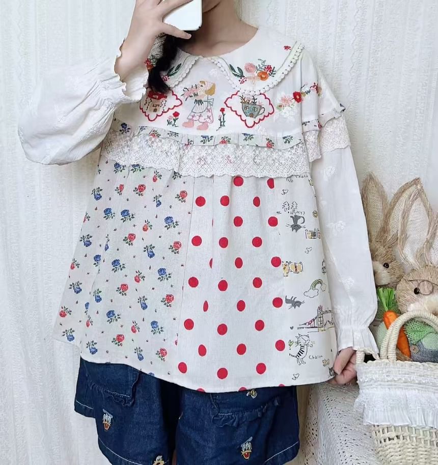 Aigan - Blouse met pofmouwen en kantversiering