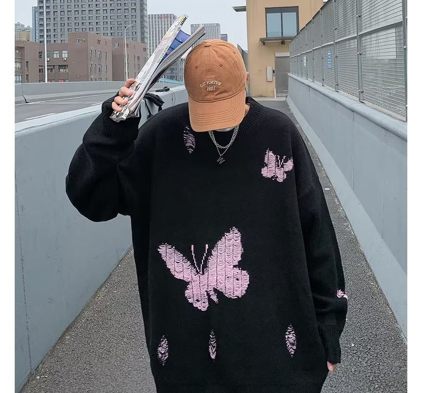 Shineon Studio - Oversized trui met ronde hals en vlinderprint