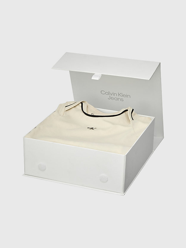Conjunto para presente composto por body e babador.