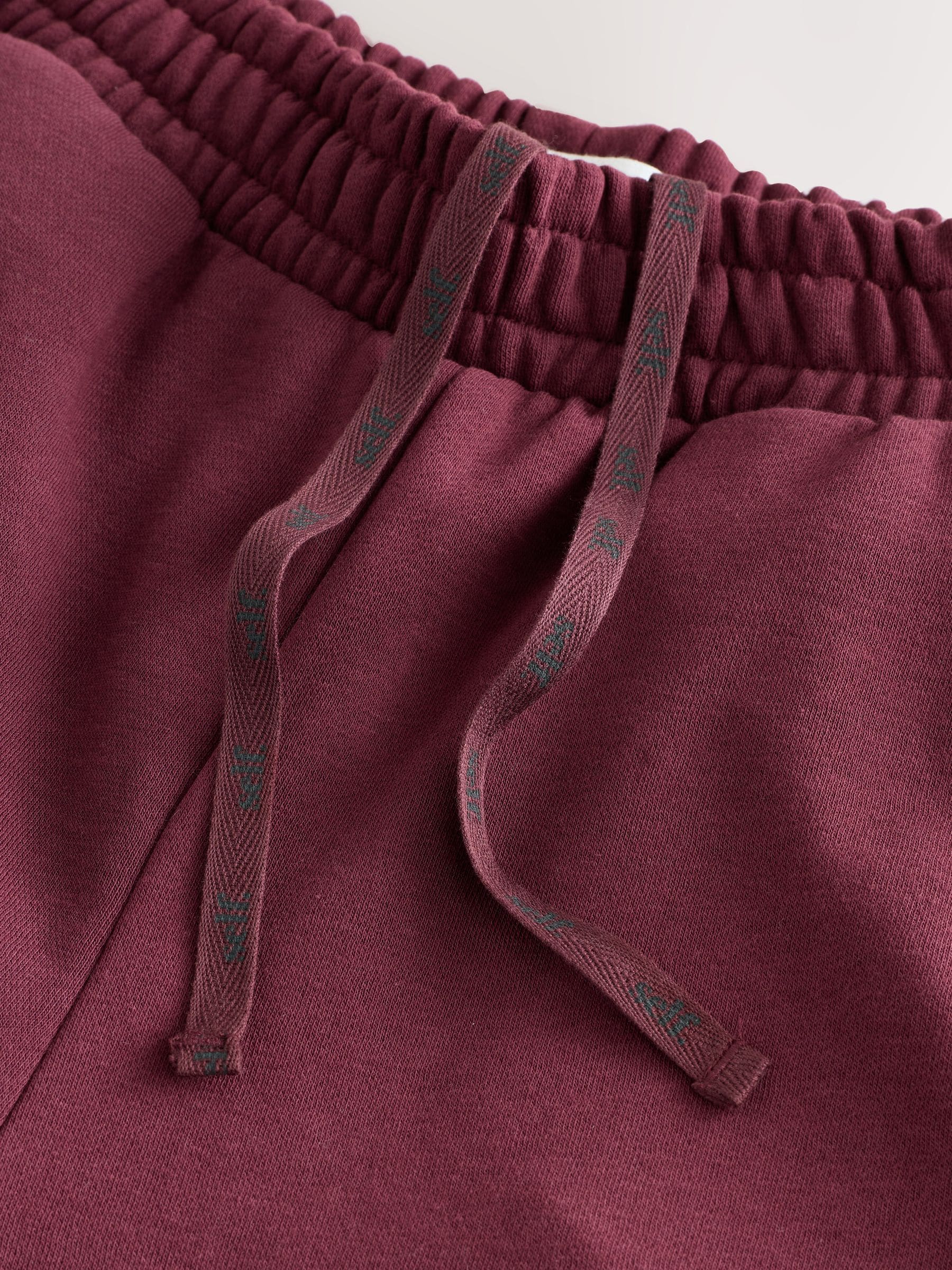 Bordeauxrood - Self. joggingbroek met boorden