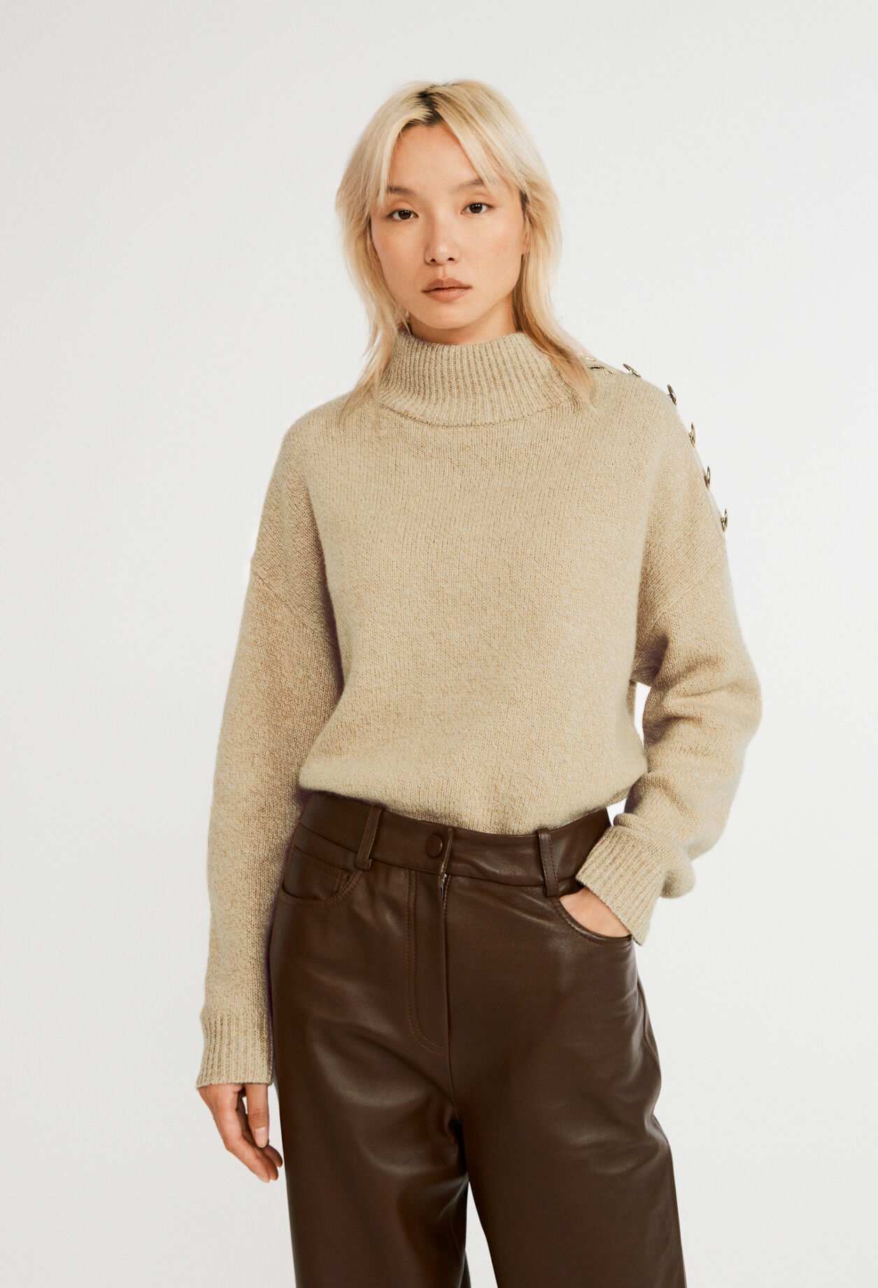 Pull &agrave; col cheminee en laine tra&ccedil;able