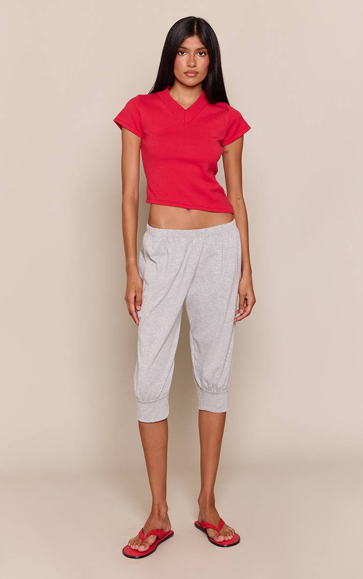 Rouge Haut Tricoté Asymétrique À Col V Haut Et Manches Courtes